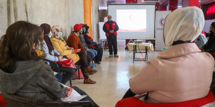 Volunteers learn the principles of humanitarian international law in an introductory workshop