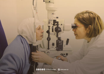 How does the Syrian Arab Red Crescent facilitate families’ access to medical care?